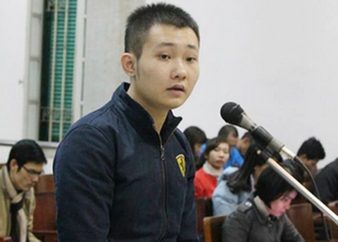 Đào Quang Khánh trong phiên xét xử hồi tháng 12/2014