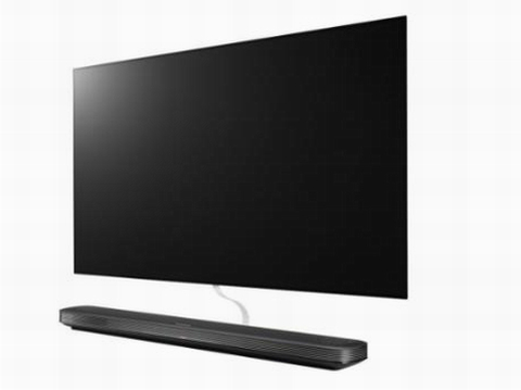3. Chiếc TV mỏng như bức tranh treo tường. Những chiếc TV ngày nay đã được cải thiện và tưởng chừng không thể mỏng hơn. Vậy mà dòng sản phẩm mới nhất của LG chỉ có độ dày bằng3/4 chiếc TV siêu mỏng hiện nay. Với hai phiên bản 65 inches và 77-inch, chiếc TV này chỉ như một miếng hợp kim được nam châm hút lên tường kim loại. Công nghệ OLED của dòng sản phẩm W Series thậm chí không dùng đến lớp ánh sáng sau. LG đã xử lý thành công bằng việc chuyển bộ vi xử lý và loa ra phía ngoài và kết nối chỉ bằng sợi dây cáp 1-inch. Hiện tại giá của sản phẩm chưa chính thức được công bố nhưng theo đánh giá nó sẽ cạnh tranh tốt trên thị trường hiện nay. 