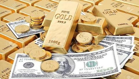 Đồng USD và vàng dự báo sẽ tăng giá trở lại trong năm nay. Ảnh minh họa