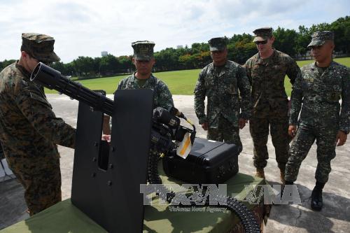 Súng máy M134D tại lễ bàn giao vũ khí của Mỹ cho Philippines ở Manila ngày 5/6. Ảnh: AFP/TTXVN
