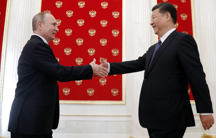 Tổng thống Putin và Chủ tịch Tập Cận Bình bắt tay giải quyết vấn đề Triều Tiên