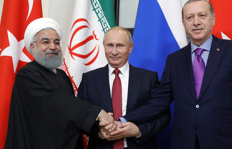 Tổng thống Putin trong cuộc gặp với Tổng thống Thổ Nhĩ Kỳ Recep Tayyip Erdogan và Tổng thống Iran Hassan Rouhani.