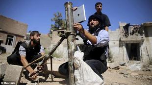 Phe nổi dậy &quot;sành điệu&quot;, dùng Ipad tấn công quân Assad