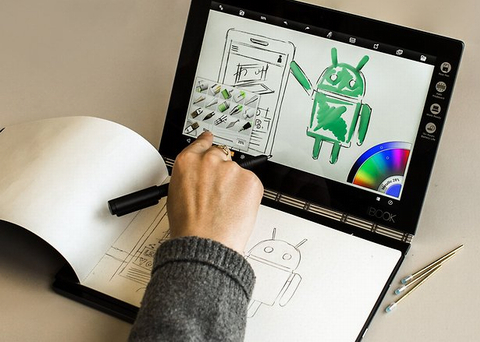 1. Lenovo Yoga Book. Lý tưởng cho những người tìm kiếm một chiếc máy tính bảng và cho những người muốn sử dụng thiết bị trong các chuyến đi kinh doanh hoặc sử dụng trong các trường đại học. Ra mắt tại IFA 2016, Lenovo Yoga Book kết hợp các yếu tố sáng tạo, thiết kế và hiệu suất trong một mô hình duy nhất. Đây là một thiết bị lai giữa máy tính xách tay và máy tính bảng. Công cụ hoàn hảo để kết hợp hiệu quả và năng suất. Mô hình này được trang bị một bàn phím tích hợp trên bề mặt cảm ứng và hiệu ứng chiếu sáng đẹp mắt. Yoga Book có thể được sử dụng như một máy tính bảng 10 inch thông thường hoặc như một máy tính xách tay. Bề mặt tích hợp bàn phím cũng có thể được sử dụng như một notepad sử dụng với bút stylus.