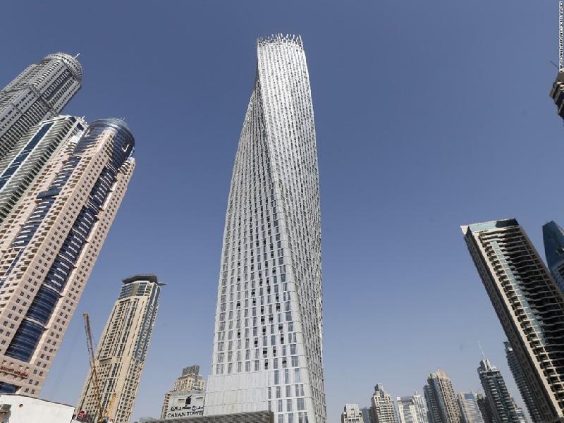 Tháp Cayan cao 306 m nằm ở Dubai, Các Tiểu vương quốc Arab (UAE) là tòa nhà thân xoắn cao thứ 3 thế giới theo Hội đồng Nhà cao tầng và Nhà ở Đô thị (CTBUH). Kiểu thiết kế thân xoắn có thể tạo ra các tòa nhà khí động học và tiết kiệm năng lượng hơn. Ảnh:Getty.