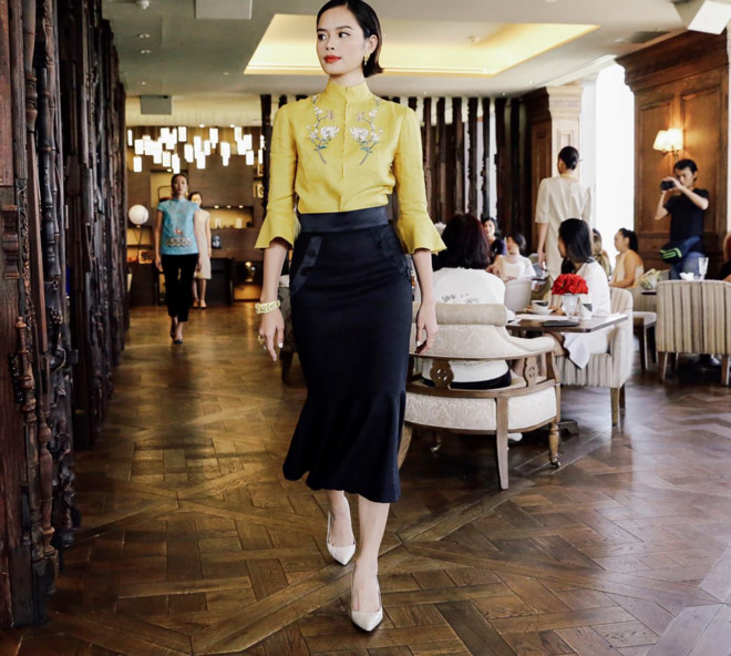 Trần Hiền gây bất ngờ khi hóa thân thành quý cô gợi cảm với sơ mi vàng và chân váy midi kiêu kỳ.