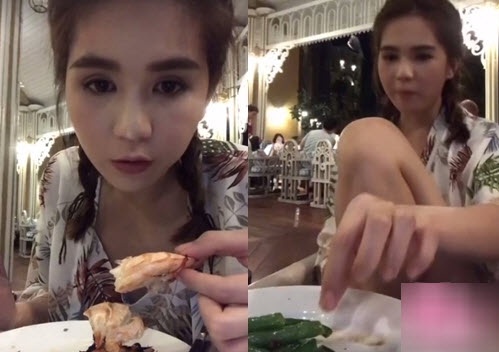 Ngọc Trinh co chân lên ghế, bỏ đũa, bốc bằng tay