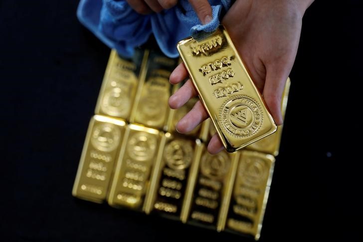 Giá vàng quay đầu giảm, USD tăng mạnh trở lại
