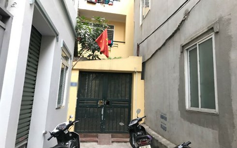 Ngõ vào ngôi nhà nơi bé K. ở với bố và mẹ kế.